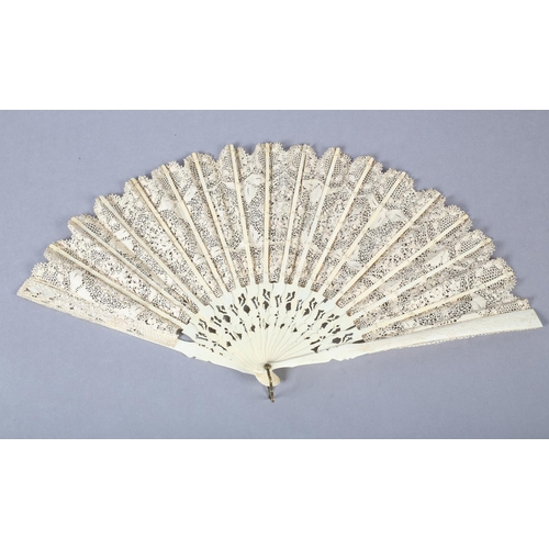 151 - A Maltese lace fan worked in silk in three horizontal panels, quite a detailed design with seven rou... 