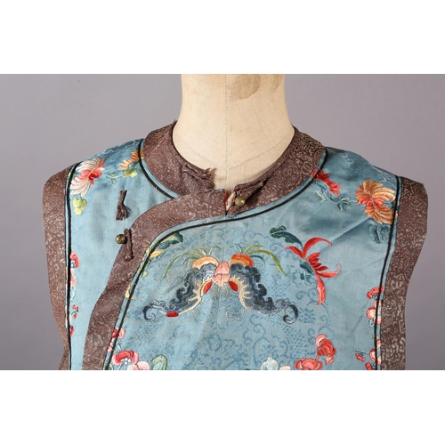 193 - A late 19th century Qing Dynasty Chinese embroidered short sleeveless lady’s tabard or sleeveless ve... 