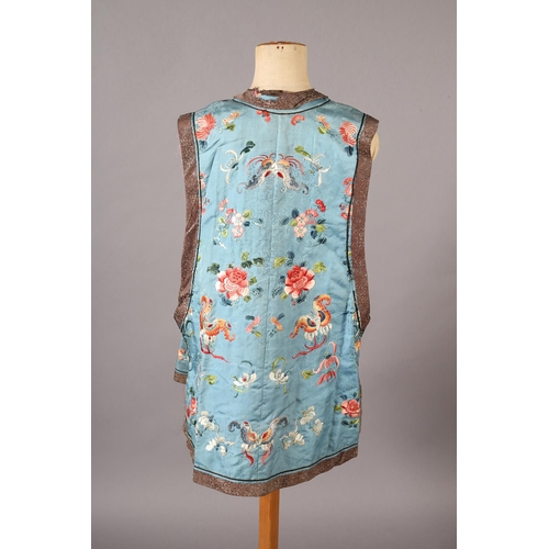 193 - A late 19th century Qing Dynasty Chinese embroidered short sleeveless lady’s tabard or sleeveless ve... 