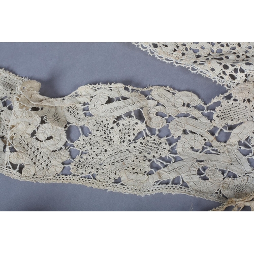 219 - Antique Lace: An 18th century or earlier panel of needle lace, guipure with intricate brides and fil... 