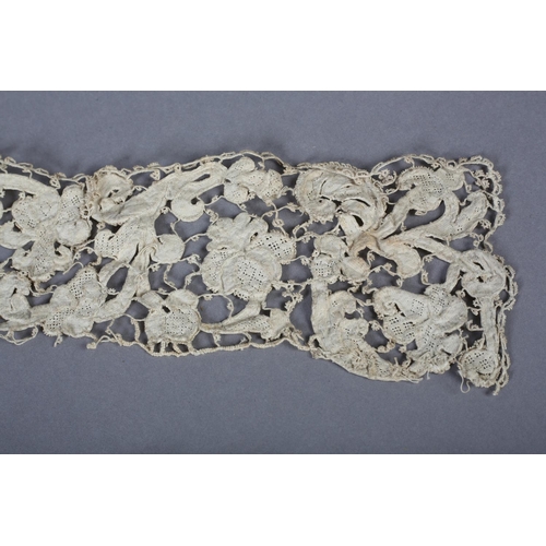 219 - Antique Lace: An 18th century or earlier panel of needle lace, guipure with intricate brides and fil... 