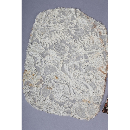 245 - Antique lace: two items in the form of cap backs, with additions, the first exquisitely worked needl... 