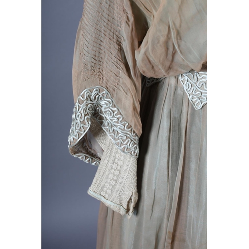 261 - An Edwardian day dress, light coffee gauze lined with sea-green silk, the dress trimmed with sea-gre... 