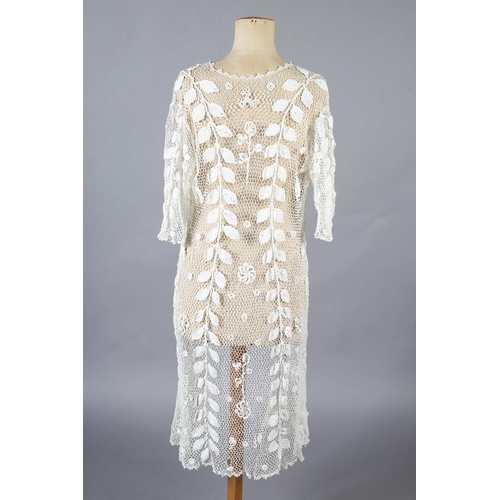 268 - Irish Crochet short sleeved, long jacket, Edwardian, designed mainly with meandering leaves interspe... 