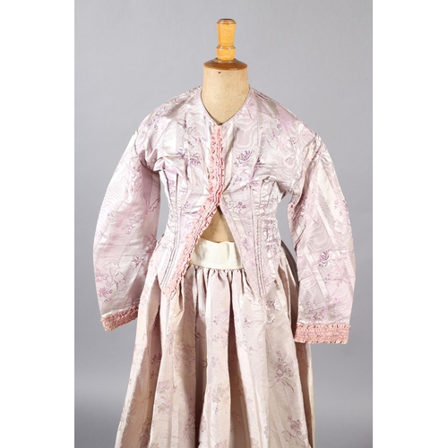 285 - A 19th century lilac silk two-piece ensemble, the silk woven with vertical cream stripes and sprays ... 