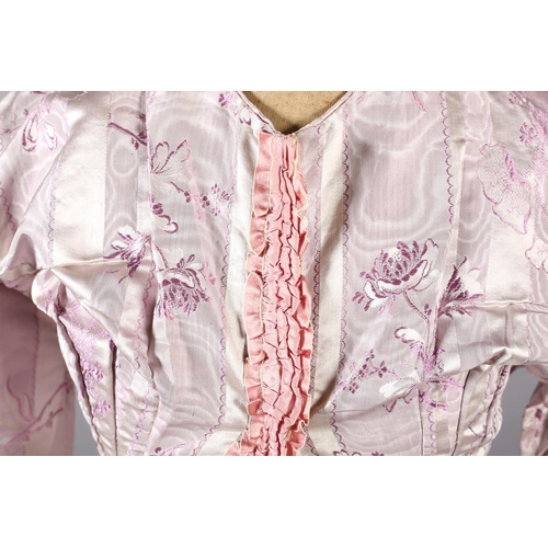 285 - A 19th century lilac silk two-piece ensemble, the silk woven with vertical cream stripes and sprays ... 