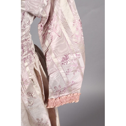 285 - A 19th century lilac silk two-piece ensemble, the silk woven with vertical cream stripes and sprays ... 