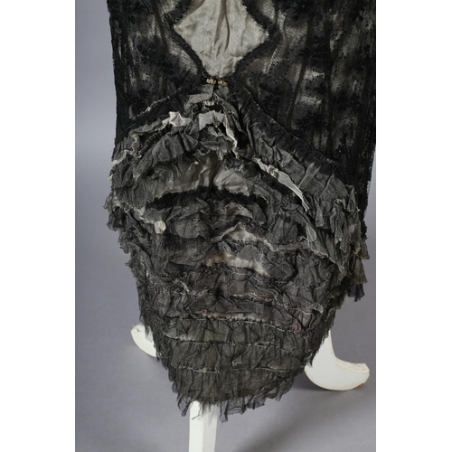 296 - A black lace 1920’s dress, full length, sleeveless, with cream silk lining, side fastening with hook... 