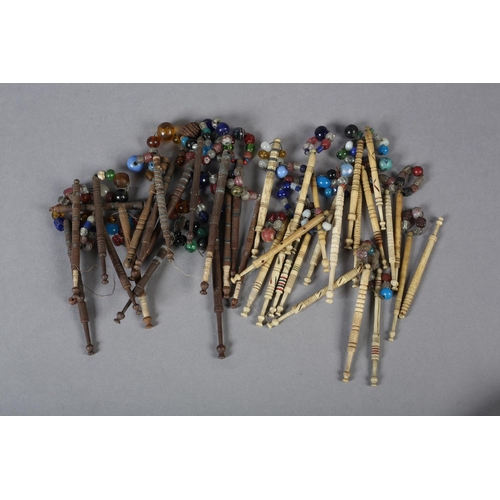 336 - Lace bobbins, a quantity, a mix of turned wood with and without spangles, several with wire decorati... 