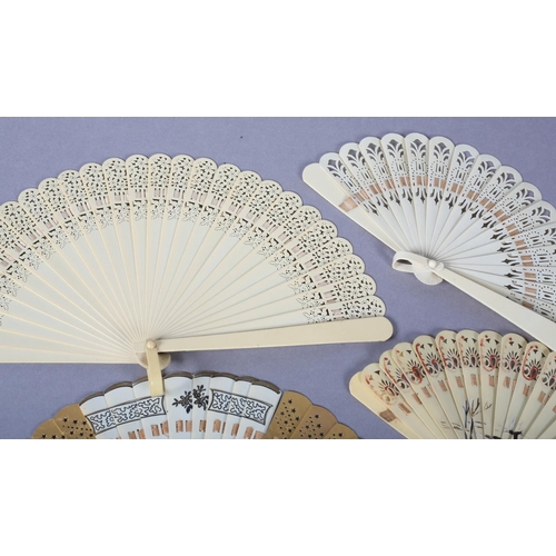 35 - A selection of small brisé fans for young girls: a celluloid example with a dancer painted in the ce... 