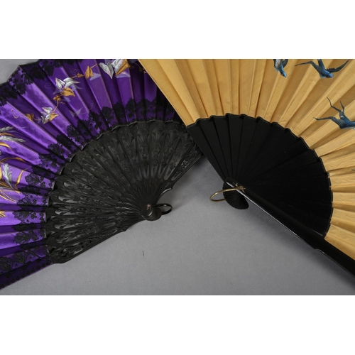 36 - A large and showy mustard silk fan c1890’s, painted with bluebirds in flight and the words “Nous rev... 