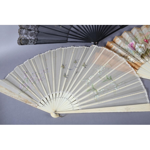 39 - Three large fans from the 1890’s, the first painted on biscuit-coloured cotton with delicate roses i... 