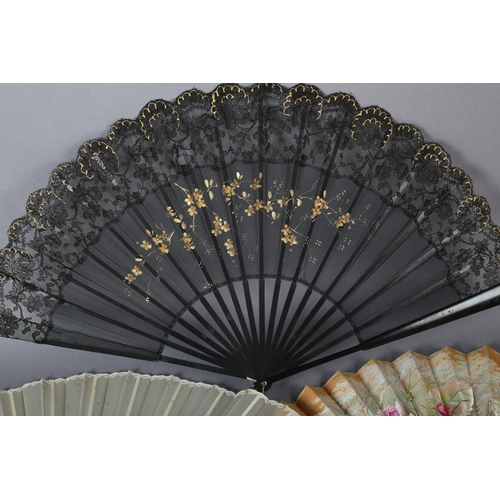 39 - Three large fans from the 1890’s, the first painted on biscuit-coloured cotton with delicate roses i... 