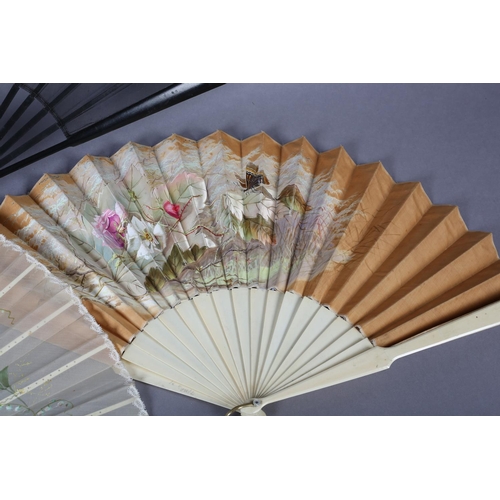 39 - Three large fans from the 1890’s, the first painted on biscuit-coloured cotton with delicate roses i... 