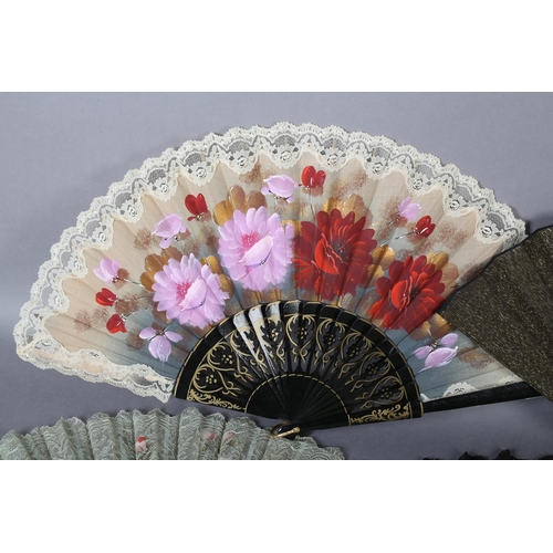 66 - Four fans dating from the 1890’s, the first with a gilded black wood monture, the recto in fabric, l... 