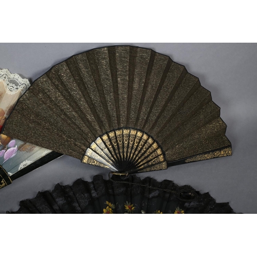 66 - Four fans dating from the 1890’s, the first with a gilded black wood monture, the recto in fabric, l... 