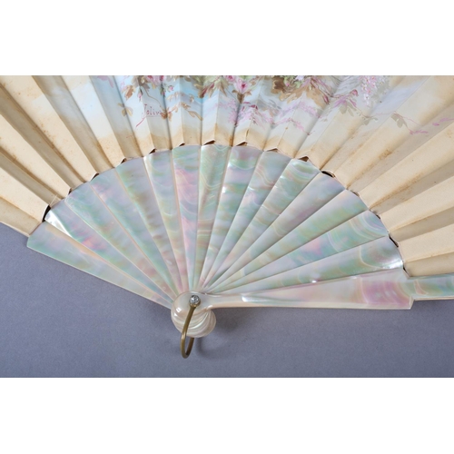 88 - A painted silk fan signed “Jolivet”, the cream leaf painted with a solitary maiden in a garden surro... 