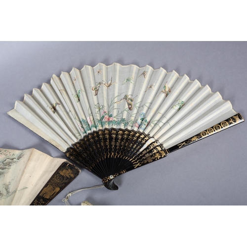 92B - Two 19th century Chinese fans, Qing dynasty, the first quite large, the cream gauze leaf painted wit... 