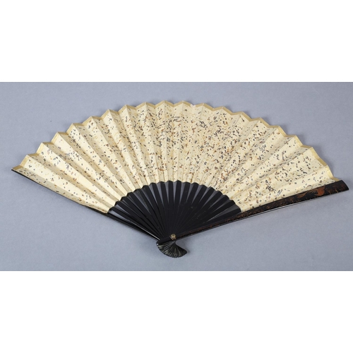 92C - An unusual, large, Chinese fan, Qing Dynasty, the monture wood, with black lacquer, the guards featu... 