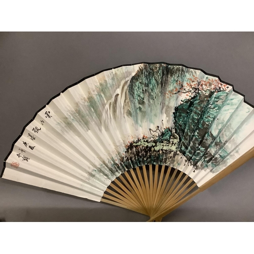 135C - A large selection of Chinese tourist fans, from the 20th century, one very large with birds and blos... 