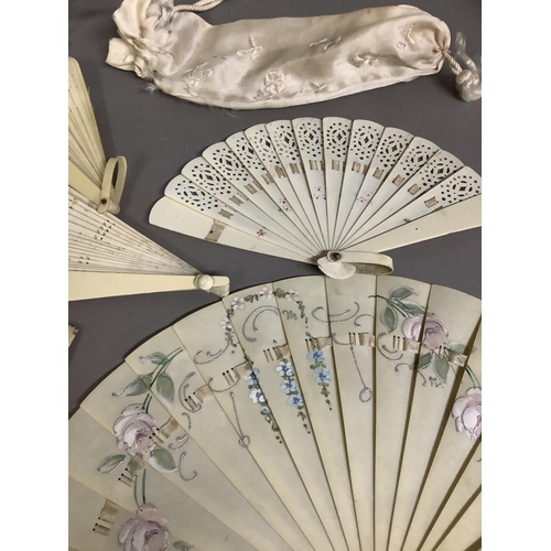 17 - Fans for young girls: a selection of five cream celluloid brisé fans, the largest approx. 15cm, bein... 