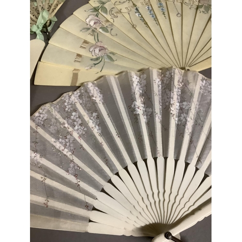 17 - Fans for young girls: a selection of five cream celluloid brisé fans, the largest approx. 15cm, bein... 