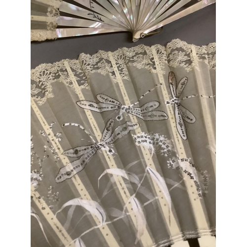 20 - Two summer fans from the 1890’s, the first with pink mother of pearl monture, the leaf of cream gauz... 