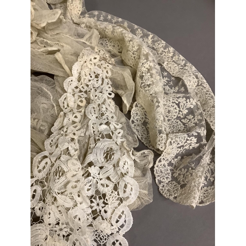 208 - Antique lace: stoles, lappets and scarves in various handmade and machine laces, to include a fine s... 