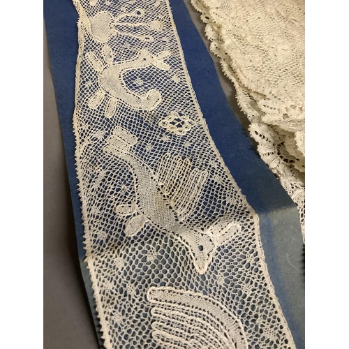 216 - Antique Lace: a good flounce of Flemish lace, bobbin with a needle ground, bearing a label “Made by ... 