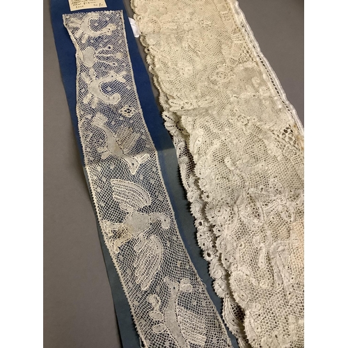 216 - Antique Lace: a good flounce of Flemish lace, bobbin with a needle ground, bearing a label “Made by ... 