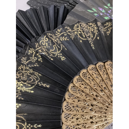 23 - A selection of 19th century fans: A palmette fan or Jenny Lind, the wood sticks dyed black, and piqu... 