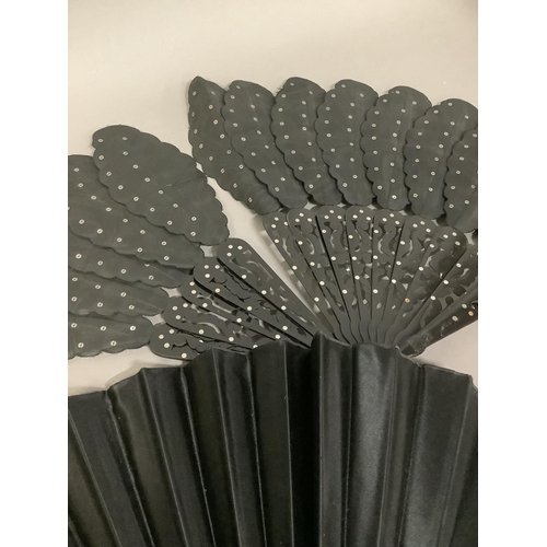 23 - A selection of 19th century fans: A palmette fan or Jenny Lind, the wood sticks dyed black, and piqu... 