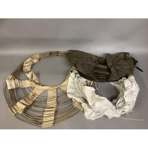 274 - A crinoline hoop, with wire rings and cream canvas panels, marked at the waist “Thomson’s Empress ne... 