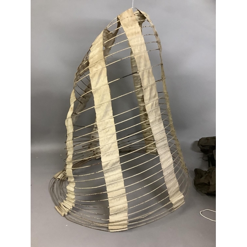 274 - A crinoline hoop, with wire rings and cream canvas panels, marked at the waist “Thomson’s Empress ne... 