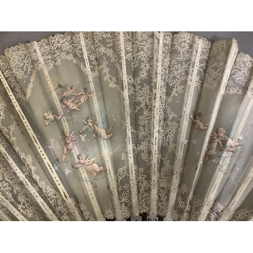 70 - Fans: one late 19th century with gilded mother of pearl monture and painted gauze leaf; a smaller c ... 