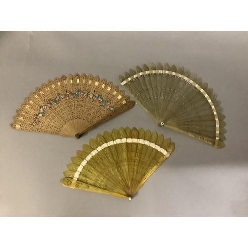 141 - Three early 19th century brisé fans, Jane Austen period, the first with original card tube, the fan ... 