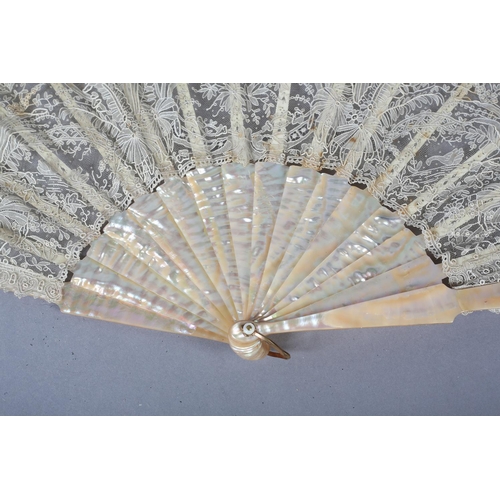 152 - A good late 19th century Brussels Point de Gaze needle-lace fan, the leaf mounted on pink mother of ... 