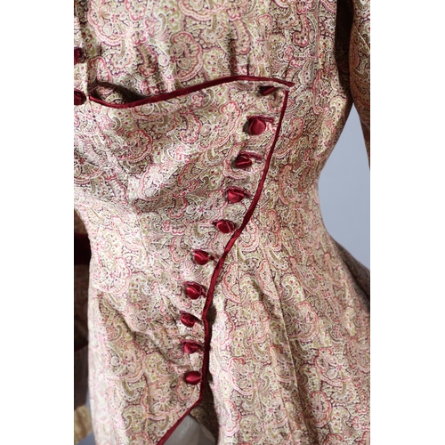 258 - Two most unusual silk bodices, the first in a very soft patterned silk trimmed with ruby velvet and ... 