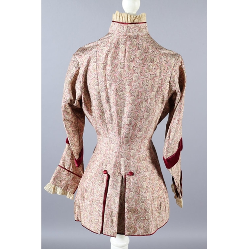 258 - Two most unusual silk bodices, the first in a very soft patterned silk trimmed with ruby velvet and ... 