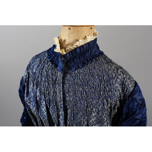 259 - A fine royal blue silk gown c 1880’s, bustle back, collar, sleeves, skirt with rushing, slightly lig... 