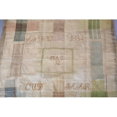 183B - A large European darning sampler “Anno 1834” and “Oud Jaar”, worked in silks on soft linen, possibly... 