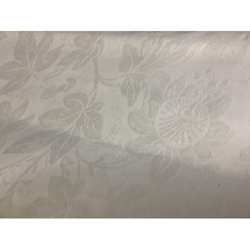 184 - A white damask banqueting cloth, floral design, possibly of a passionflower, with tendrils and leave... 