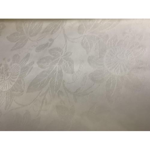 184 - A white damask banqueting cloth, floral design, possibly of a passionflower, with tendrils and leave... 