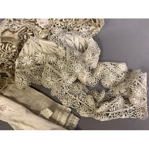 234 - 19th century lace caps and mittens: the first cap of Bedfordshire Maltese lace, with raised veining ... 