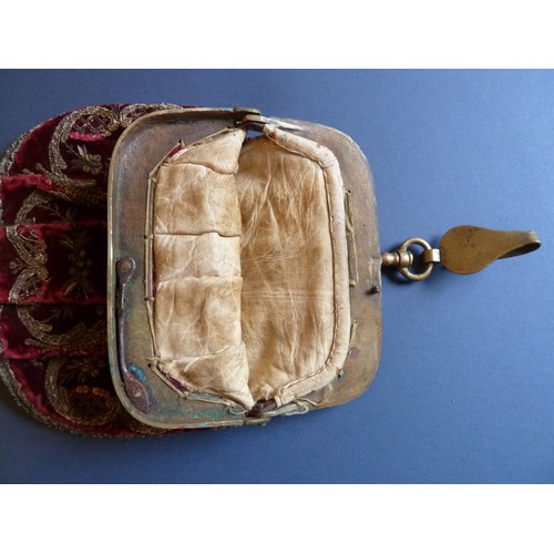 279 - An 18 th century or later ruby velvet gold coloured metal-framed bag with belt or chatelaine hook, l... 