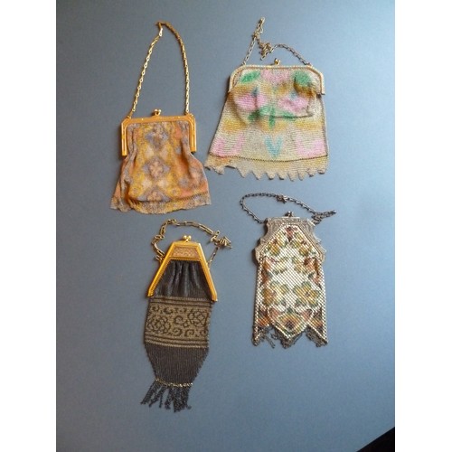 307B - Four early 20th century mesh bags, two particularly stylish in shape, all with metal frames, the fir... 