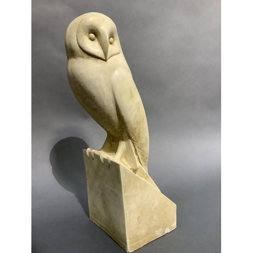 21 - A cast figure of an owl, 40cm high