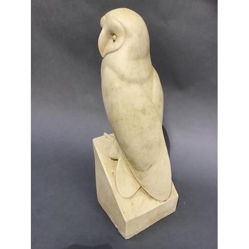 21 - A cast figure of an owl, 40cm high