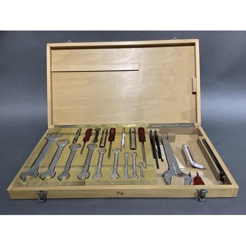 51 - A German Saltus wooden tool case fitted with  spanners in graduated sizes, screwdrivers, socket scre... 