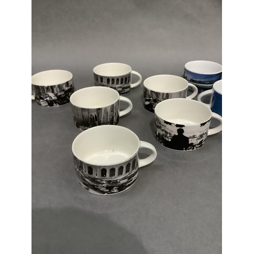 105 - A set of 19 Royal Doulton British Airways coffee mugs, each printed with a different photographic de... 